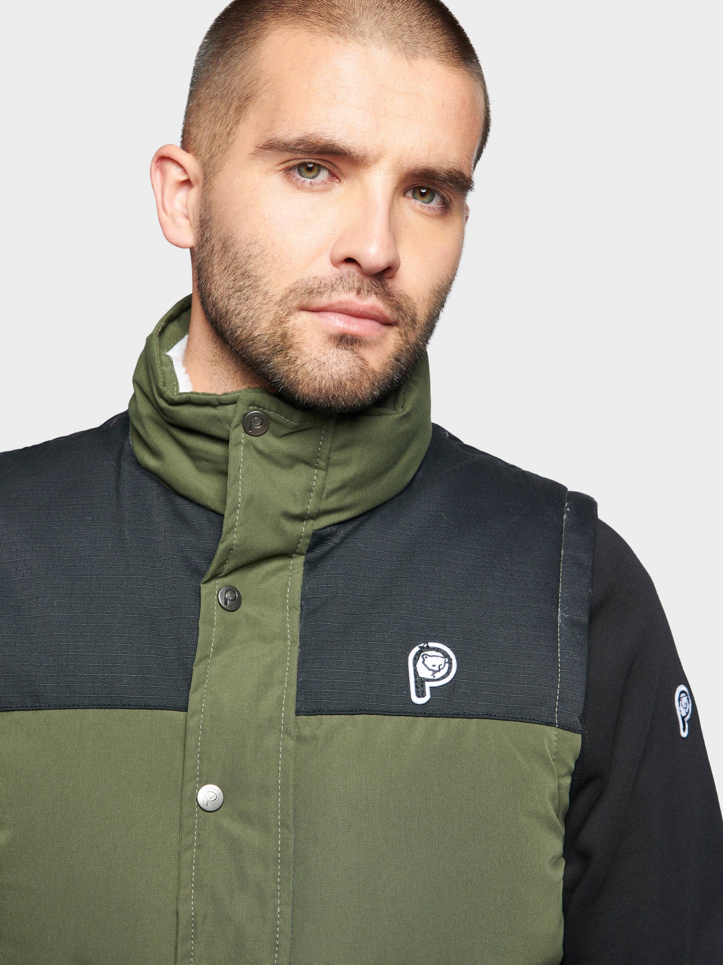 P Bear Cut + Sew Funnel Neck Puffer Vest in Forest Night